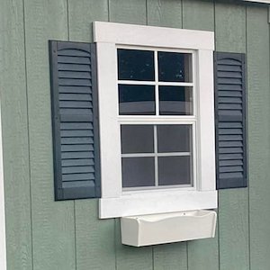 extra shutters and flower boxes